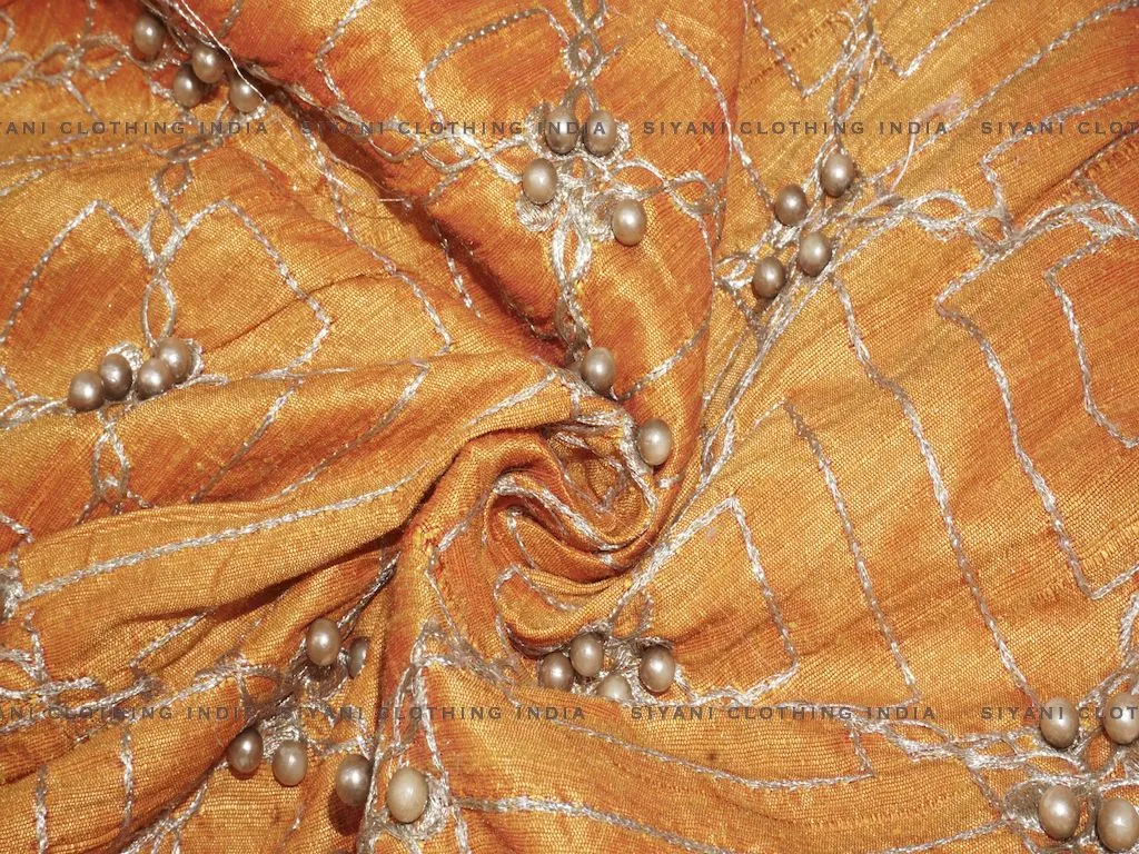 Orange Thread And Motifs Embroidered Silk Fabric